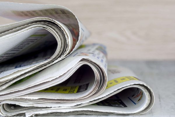 a-small-pile-of-newspapers-2021-09-01-01-20-30-utc